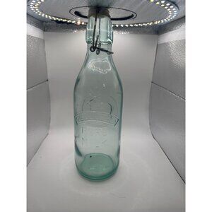 Antique Embossed Glass Milk Bottle With Wire Swing Top Closure & Cow Design